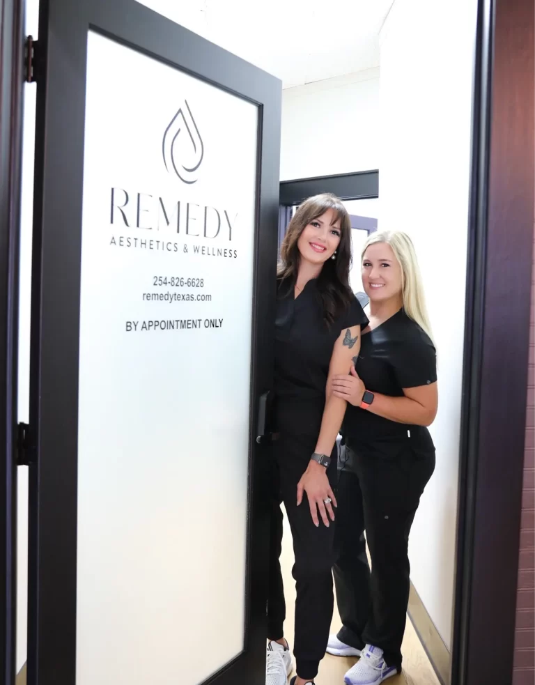 Team at Remedy Aesthetics and Wellness welcoming clients at Victoria Texas clinic entrance